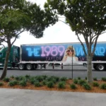 Concert tour truck with vibrant signage