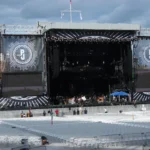 Outdoor concert venue with empty seats