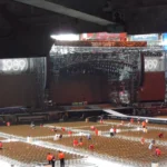 Large outdoor concert venue preparation